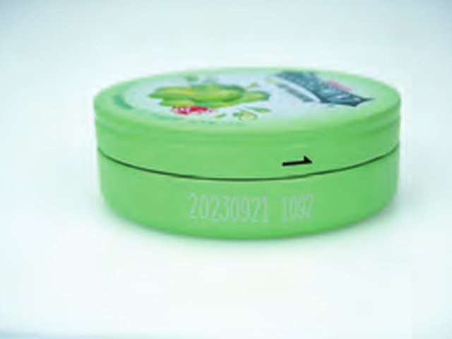 Fibre laser code on a metal tin
